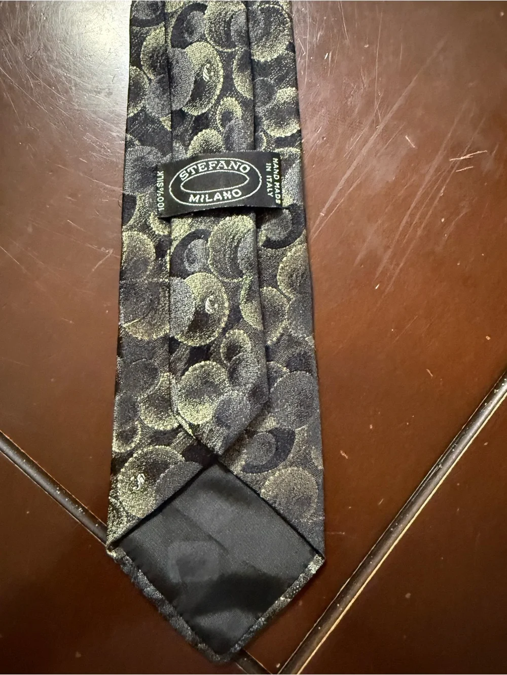 Classic Black Tie with Gold Circular Jacquard Pattern